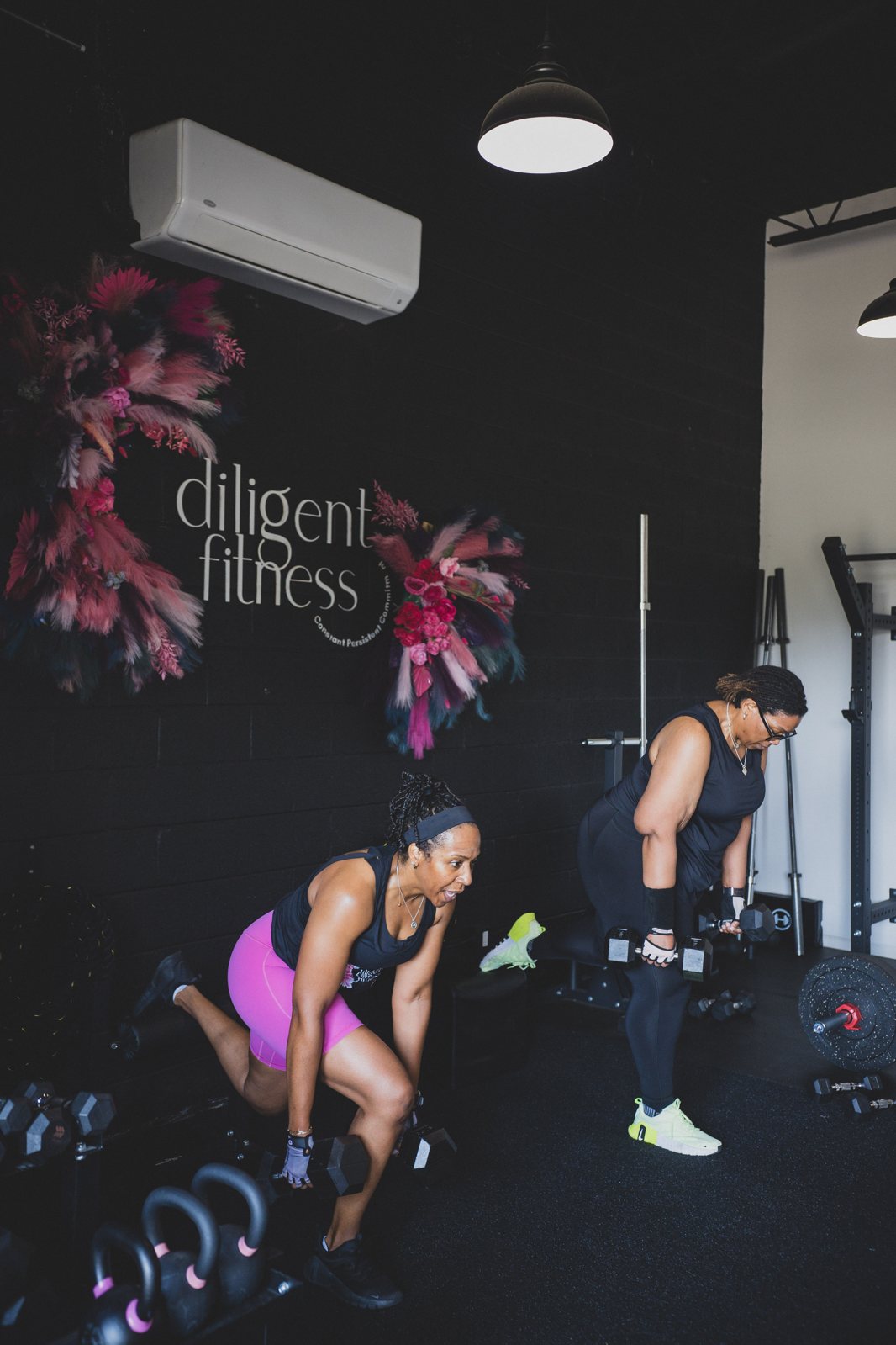 Members lifting weights